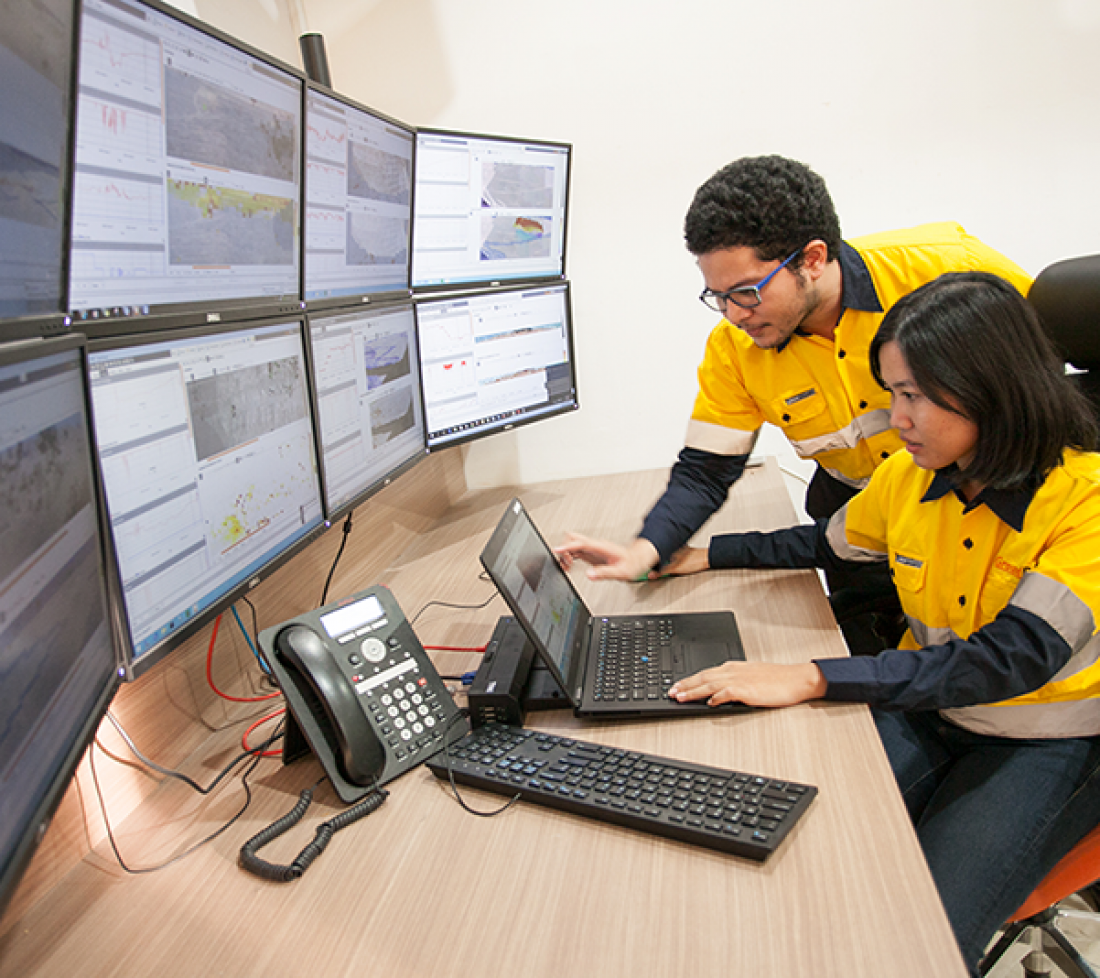 Two people working at the Geotechnical support services